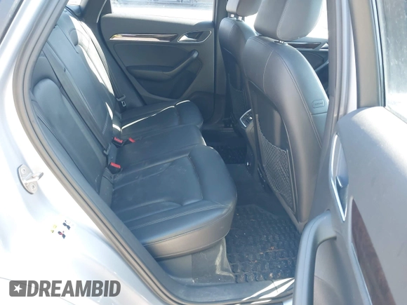 2015 Audi Q3 2.0T Premium Plus with VIN WA1EFCFSXFR010015, listed as a IAAI auction lot 42099410 with 142,117 mi miles. Bid and sale history available at carsss.com. Image 8.