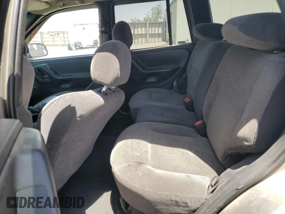 1999 Jeep Grand Cherokee Laredo with VIN 1J4GW58S1XC775877, listed as a Copart auction lot 55639795 with 197,611 mi miles and Salvage title. Bid and sale history available at DreamBid. Image 11.