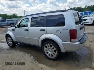 2011 Dodge Nitro Heat with VIN 1D4PU4GK0BW604975, listed as a Copart auction lot 56979275 with 160,494 mi miles and Salvage title. Bid and sale history available at DreamBid. Image 2.