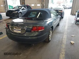 2002 Chrysler Sebring Limited with VIN 1C3EL65R92N272242, listed as a IAAI auction lot 41164755 with 52,086 mi miles and . Bid and sale history available at DreamBid. Image 4.