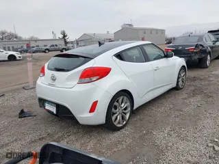 2015 Hyundai Veloster RE:FLEX with VIN KMHTC6AD1FU232077, listed as a IAAI auction lot 41529502 with 201,833 mi miles. Bid and sale history available at carsss.com. Image 4.