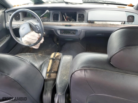 1999 Ford Crown Victoria LX with VIN 2FAFP74WXXX137154, listed as a Copart auction lot 71418784 with 97,589 mi miles and Salvage Title. Bid and sale history available at carsss.com. Image 8.