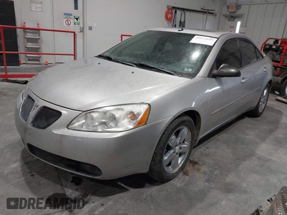2005 Pontiac G6 GT with VIN 1G2ZH528854167162, listed as a IAAI auction lot 40973635 with 207,742 mi miles. Bid and sale history available at carsss.com. Image 2.