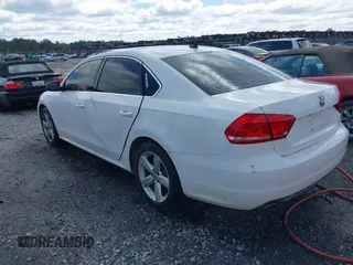2013 Volkswagen Passat SE w/Sunroof & Nav with VIN 1VWBP7A36DC084901, listed as a IAAI auction lot 41937719 with 255,125 mi miles. Bid and sale history available at carsss.com. Image 3.