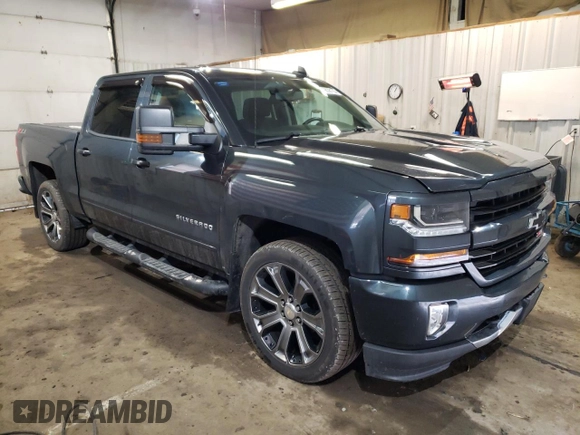 2018 Chevrolet Silverado 1500 LT with VIN 3GCUKREC5JG121283, listed as a Copart auction lot 49836155 with 95,838 mi miles and Salvage Title. Bid and sale history available at DreamBid. Image 4.