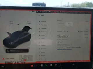 2022 Tesla Model Y Long Range z VIN 7SAYGDEE7NA014402, wystawiony jako Copart lot #56325005 z przebiegiem 41 171 mil mil oraz Szkody całkowita. Historia ofert i sprzedaży dostępna na DreamBid. Obrazek 9.