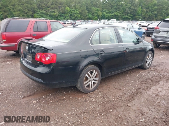 2005 Volkswagen Jetta 2.5L with VIN 3VWDF71K65M641809, listed as a IAAI auction lot 42230703 with 215,996 mi miles and . Bid and sale history available at DreamBid. Image 4.