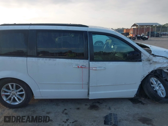 2016 Dodge Grand Caravan SXT with VIN 2C4RDGCGXGR257633, listed as a IAAI auction lot 41514684 with 108,743 mi miles and . Bid and sale history available at DreamBid. Image 13.