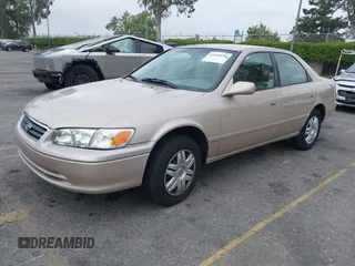 2001 Toyota Camry CE with VIN 4T1BG22K81U075758, listed as a IAAI auction lot 42024950 with 107,439 mi miles. Bid and sale history available at carsss.com. Image 2.