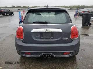2014 MINI Hardtop S with VIN WMWXM7C54ET985344, listed as a Copart auction lot 52012465 with 87,017 mi miles and Salvage title. Bid and sale history available at DreamBid. Image 6.