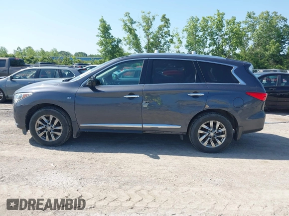 2014 Infiniti QX60 with VIN 5N1AL0MM6EC506295, listed as a IAAI auction lot 42549315 with 157,766 mi miles and . Bid and sale history available at DreamBid. Image 14.