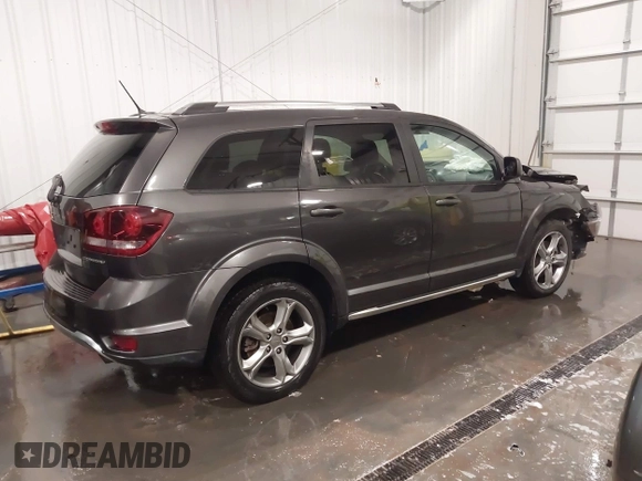 2017 Dodge Journey Crossroad Plus with VIN 3C4PDCGB5HT517269, listed as a IAAI auction lot 41835856 with 97,876 mi miles and . Bid and sale history available at DreamBid. Image 4.