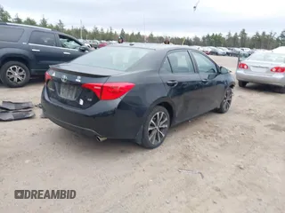 2017 Toyota Corolla L with VIN 2T1BURHE4HC781186, listed as a IAAI auction lot 41957711 with 100,539 mi miles and . Bid and sale history available at DreamBid. Image 4.