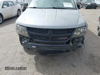 2019 Dodge Journey SE z VIN 3C4PDCBB5KT861358, wystawiony jako IAAI lot #41947841 z przebiegiem 82 099 mil mil oraz . Historia ofert i sprzedaży dostępna na DreamBid. Obrazek 6.