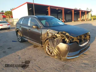 2019 Mazda CX-9 Signature with VIN JM3TCBEY5K0331147, listed as a IAAI auction lot 42026101 with 64,499 mi miles and . Bid and sale history available at DreamBid. Image 1.