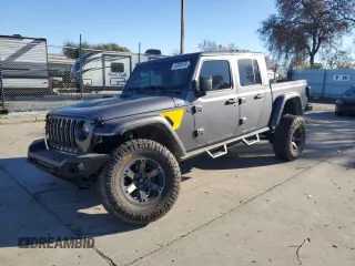 2021 Jeep Gladiator Rubicon с VIN 1C6JJTBM4ML594204, выставлен на аукционе Copart как лот 83998224 с пробегом 25 852 миль миль и Списание • Salvage title. История ставок и продаж доступна на DreamBid. Изображение 1.