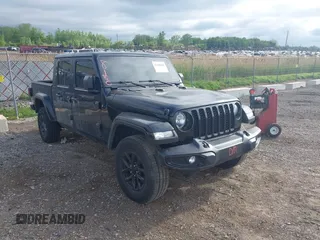 2022 Jeep Gladiator Texas Trail with VIN 1C6HJTAG7NL125006, listed as a IAAI auction lot 42288180 with 96,694 mi miles and . Bid and sale history available at DreamBid. Image 1.