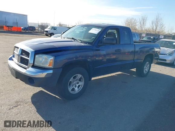 2005 Dodge Dakota SLT with VIN 1D7HW42N15S365967, listed as a IAAI auction lot 41798935 with 220,243 mi miles and . Bid and sale history available at DreamBid. Image 2.