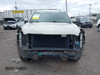 2015 GMC Yukon XL SLT with VIN 1GKS2HKC7FR100534, listed as a IAAI auction lot 41229658 with 207,947 mi miles. Bid and sale history available at carsss.com. Image 6.