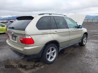 2001 BMW X5 3.0i with VIN WBAFA535X1LM64227, listed as a IAAI auction lot 41885244 with 224,646 mi miles. Bid and sale history available at carsss.com. Image 4.