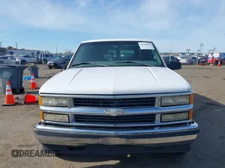 1997 Chevrolet Suburban with VIN 3GNFK16R4VG126095, listed as a IAAI auction lot 41548470 with 290,502 mi miles. Bid and sale history available at carsss.com. Image 6.