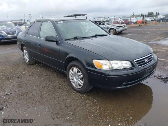 2000 Toyota Camry CE with VIN JT2BG22KXY0432288, listed as a IAAI auction lot 41927856 with 203,035 mi miles. Bid and sale history available at carsss.com. Image 1.