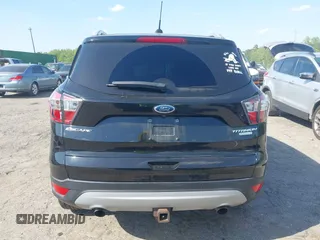 2017 Ford Escape Titanium with VIN 1FMCU0J91HUA75417, listed as a IAAI auction lot 42044170 with 116,431 mi miles. Bid and sale history available at carsss.com. Image 17.