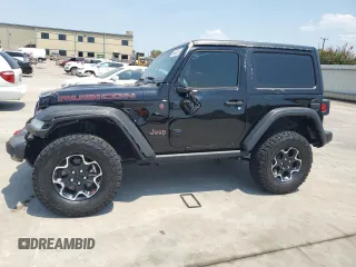 2023 Jeep Wrangler Rubicon with VIN 1C4HJXCG6PW679118, listed as a Copart auction lot 66469354 with 5,038 mi miles and Salvage title. Bid and sale history available at DreamBid. Image 1.