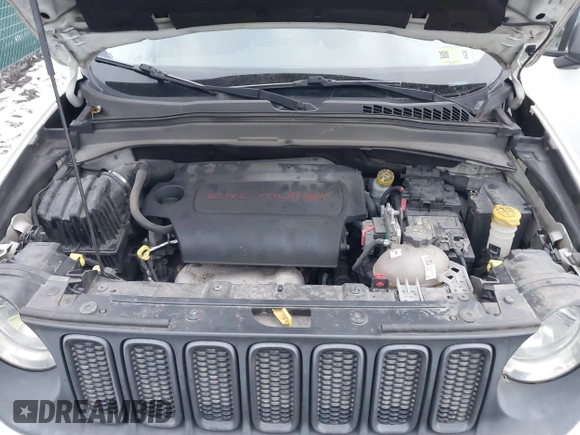 2015 Jeep Renegade Trailhawk with VIN ZACCJBCT5FPB91056, listed as a IAAI auction lot 41609659 with 145,109 mi miles and . Bid and sale history available at DreamBid. Image 10.