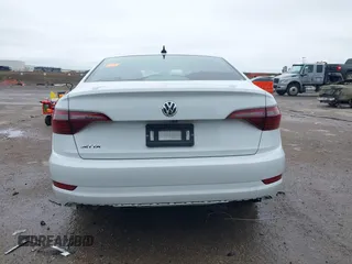 2021 Volkswagen Jetta S z VIN 3VWC57BUXMM017430, wystawiony jako IAAI lot #41947038 z przebiegiem 50 277 mil mil oraz . Historia ofert i sprzedaży dostępna na DreamBid. Obrazek 17.