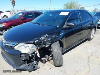 2014 Toyota Camry Hybrid LE with VIN 4T1BD1FK1EU127878, listed as a IAAI auction lot 41823638 with 179,141 mi miles. Bid and sale history available at carsss.com. Image 2.