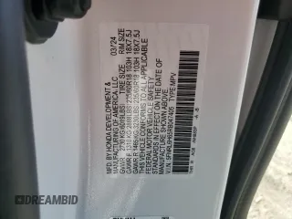2024 Honda Odyssey EX-L z VIN 5FNRL6H65RB047405, wystawiony jako Copart lot #57880245 z przebiegiem Nie podano mil oraz Czysty tytuł • Clean title. Historia ofert i sprzedaży dostępna na DreamBid. Obrazek 13.
