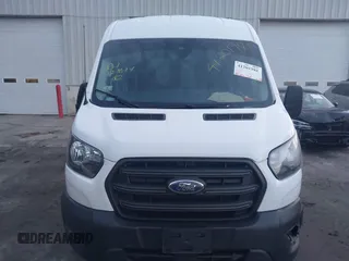 2020 Ford Transit Cargo z VIN 1FTBR2C87LKA34635, wystawiony jako IAAI lot #41201981 z przebiegiem 89 814 mil mil oraz . Historia ofert i sprzedaży dostępna na DreamBid. Obrazek 12.