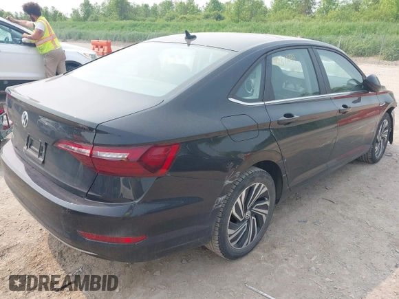 2020 Volkswagen Jetta SEL z VIN 3VWEB7BU9LM023817, wystawiony jako IAAI lot #42371694 z przebiegiem 99 100 mil mil oraz . Historia ofert i sprzedaży dostępna na DreamBid. Obrazek 4.