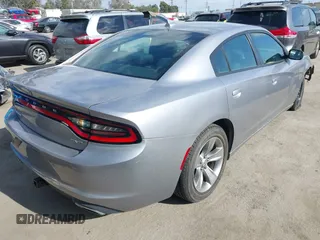 2016 Dodge Charger SXT with VIN 2C3CDXHG6GH313155, listed as a IAAI auction lot 42096229 with 68,808 mi miles and . Bid and sale history available at carsss.com. Image 4.
