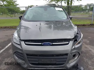 2013 Ford Escape SEL z VIN 1FMCU9H96DUC66206, wystawiony jako IAAI lot #42376442 z przebiegiem 96 776 mil mil oraz . Historia ofert i sprzedaży dostępna na DreamBid. Obrazek 12.