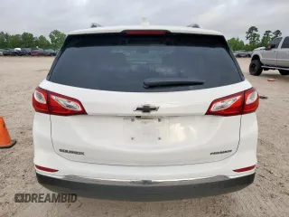 2020 Chevrolet Equinox Premier z VIN 2GNAXNEVXL6226096, wystawiony jako Copart lot #56744635 z przebiegiem 33 594 mil mil oraz Szkoda całkowita • Salvage title. Historia ofert i sprzedaży dostępna na DreamBid. Obrazek 6.