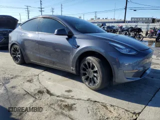 2023 Tesla Model Y Long Range with VIN 7SAYGDEE2PA047794, listed as a Copart auction lot 48397305 with 18,850 mi miles and Salvage Title. Bid and sale history available at DreamBid. Image 4.