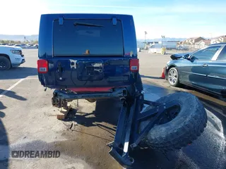 2008 Jeep Wrangler Unlimited Rubicon with VIN 1J8GA69158L616452, listed as a IAAI auction lot 41391875 with 91,143 mi miles and . Bid and sale history available at DreamBid. Image 17.