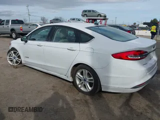 2018 Ford Fusion SE z VIN 3FA6P0LU5JR188171, wystawiony jako IAAI lot #41632358 z przebiegiem 73 677 mil mil oraz . Historia ofert i sprzedaży dostępna na DreamBid. Obrazek 3.