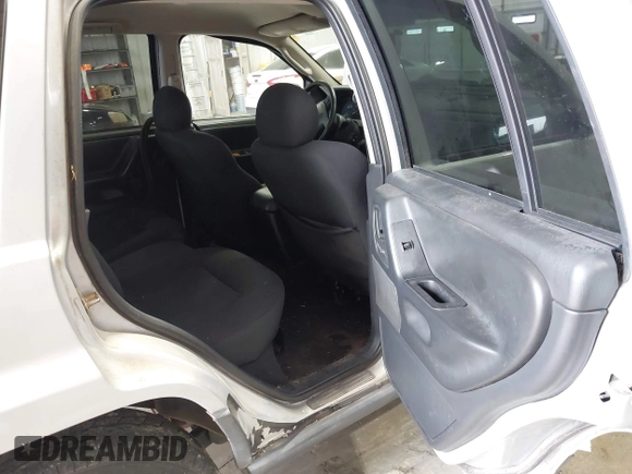 2004 Jeep Grand Cherokee Laredo with VIN 1J4GW48S44C161864, listed as a IAAI auction lot 42764536 with 143,833 mi miles and . Bid and sale history available at DreamBid. Image 8.