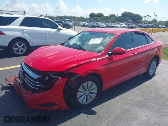 2019 Volkswagen Jetta S z VIN 3VWC57BUXKM029610, wystawiony jako IAAI lot #42334649 z przebiegiem 34 072 mil mil oraz . Historia ofert i sprzedaży dostępna na DreamBid. Obrazek 2.