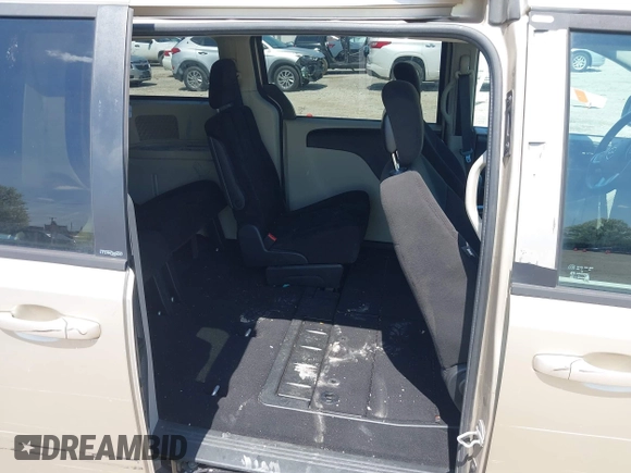 2013 Dodge Grand Caravan SE with VIN 2C4RDGBG9DR642162, listed as a IAAI auction lot 42113378 with 182,370 mi miles and . Bid and sale history available at DreamBid. Image 8.
