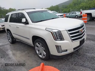 2015 Cadillac Escalade Premium with VIN 1GYS4NKJ4FR721677, listed as a IAAI auction lot 42300588 with 76,753 mi miles and . Bid and sale history available at DreamBid. Image 1.