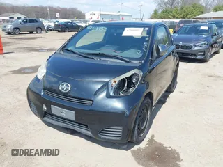 2012 Scion iQ with VIN JTNJJXB03CJ018302, listed as a IAAI auction lot 42000097 with 191,918 mi miles. Bid and sale history available at carsss.com. Image 18.