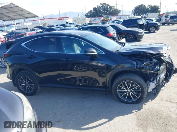 2025 Lexus NX 350h with VIN 2T2AKCEZ1SC039174, listed as a IAAI auction lot 41594338 with 5,586 mi miles and . Bid and sale history available at DreamBid. Image 14.