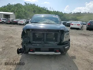 2021 Nissan Titan SV with VIN 1N6AA1ED7MN530751, listed as a Copart auction lot 62183225 with 63,430 mi miles and Salvage title. Bid and sale history available at DreamBid. Image 14.