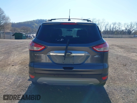 2015 Ford Escape SE with VIN 1FMCU9G97FUA89251, listed as a IAAI auction lot 41919240 with 148,472 mi miles and . Bid and sale history available at DreamBid. Image 16.