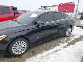 2014 Ford Fusion SE Hybrid with VIN 3FA6P0LUXER236740, listed as a IAAI auction lot 41399510 with 82,720 mi miles. Bid and sale history available at carsss.com. Image 14.