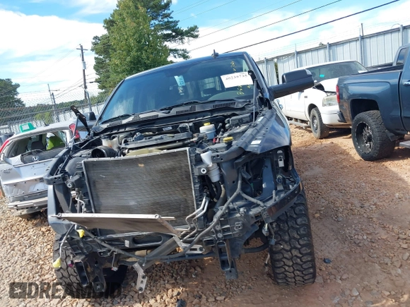 2016 Ram 2500 Laramie with VIN 3C6UR5FL8GG217024, listed as a IAAI auction lot 40235735 with 82,212 mi miles. Bid and sale history available at carsss.com. Image 13.